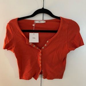 addika orange button up top